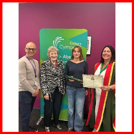 April Hughes receiving her WLCOW Award Winner 2025