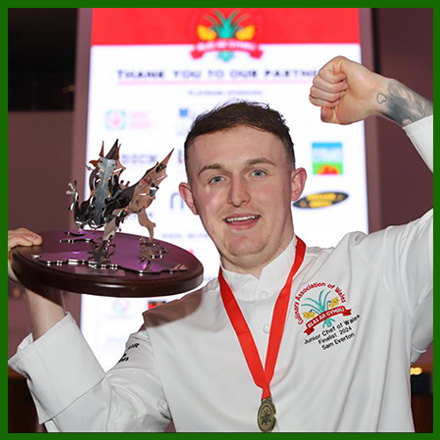  Sam Everton pictured holding a dragon trophy  